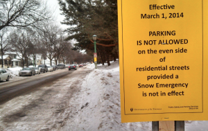 Usually lined with cars, the south side of Selby Avenue is now empty after the city of St. Paul restricted parking on the even sides of residential roads to help emergency vehicles get down the streets narrowed by snow. (Simeon Lancaster/TommieMedia)
