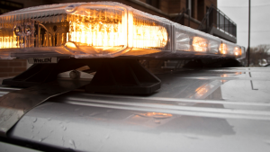 Public Safety vehicle lights flash in front of the St. Thomas Public Safety office. State Patrol Sgt. Jesse Grabow from the Minnesota Department of Public Safety said the department wants to do whatever possible "to reduce the number of fatalities on the roadways" during the spring break season. (Eric Wuebben/TommieMedia) 