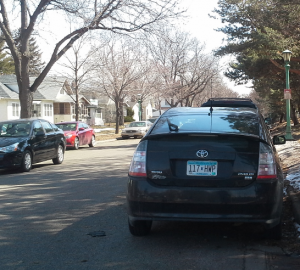 Selby Avenue is lined with cars after the City of St. Paul lifted the one-sided parking restrictions. The city removed the ban March 27 after the fire department determined the streets were again wide enough for emergency vehicles. (Rebecca Mariscal/TommieMedia)