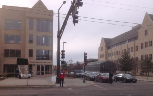 Cars line up at the corner of Cretin and Grand after exiting the Anderson Parking Facility. Construction on South Campus has limited access to parking lots and the ramp. (Grace Pastoor/TommieMedia)