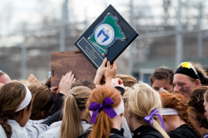 The St. Thomas softball team celebrates their MIAC championship. The Tommies will take on Augustana College in the first round of the NCAA tournament (Andrew Stafford/TommieMedia).