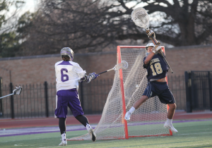 Sean Hickey fires a shot on goal in a game against Bethel earlier this season. St. Thomas defeated the Reinhardt Eagles 13-6 in the opening round of the MCLA Division-II national tournament Monday night. (Jake Remes/TommieMedia)