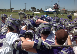 The St. Thomas club lacrosse team gathers together. St. Thomas defeated North Dakota State 8-6 Tuesday to advance to the final four. (Photo credit to  Brian Schublooom)