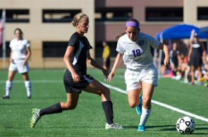 Senior captain Taylor Sabrowski rushes up the left wing. The St. Thomas women's soccer team notched its first win of the season Saturday, defeating Wisconsin-Stevens Point 2-0. (Jacob Sevening/TommieMedia)