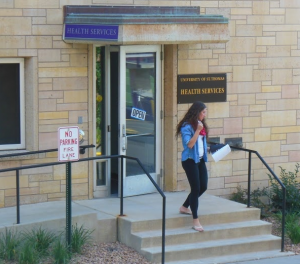 A St. Thomas student walks out of the Health Services office. The Minnesota Department of Health said that college students don't have to worry as much about enterovirus D68. (Theresa Bourke/TommieMedia)