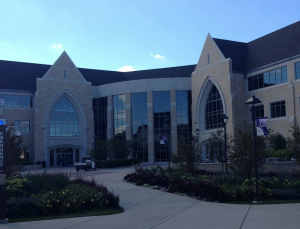 Solar panels are installed on the Anderson Student Center on the morning of Monday, Sept. 22. The project was budgeted at $144,320. (Lauren Smith/TommieMedia) 