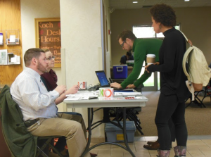 Volunteers help students and faculty members register to donate blood. The blood drive was held on Tuesday and Wednesday in Koch Commons. (Theresa Bourke/TommieMedia)