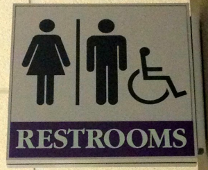 A current restroom sign in the Anderson Student Center indicates both male and female bathrooms. A recent Minneapolis resolution encouraged gender-neutral bathrooms to accommodate for transgender people. (Lauren Smith/TommieMedia)
