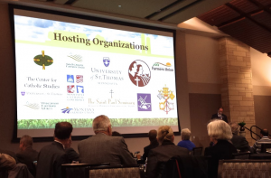 Executive Director of Catholic Rural Life James Ennis kicks off the symposium with an introduction and opening remarks. Ennis gave information about the symposium's goals, co-hosts and participants. (Jamie Bernard/TommieMedia) 