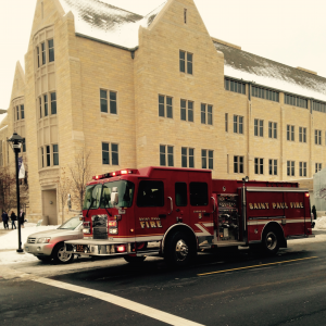 A St. Paul fire truck sits on the road near South Campus. A lab fire in Owens Science Hall caused the building to be evacuated Wednesday afternoon. (Scott Sikich/TommieMedia) 