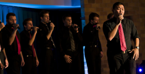 Senior Chad Berg sings a solo at the Summit Singers' concert last year. The group won't be receiving funds from USG for its concert this year. (Eric Wuebben/TommieMedia)