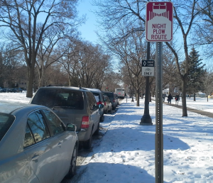 St. Thomas students, faculty and staff park their cars along Summit Avenue, a night plow route. Now that the city’s street sweep has been canceled, attention turns to parking restrictions caused by snow emergencies. (Rebecca Mariscal/TommieMedia)