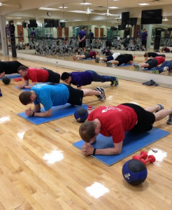 Seminarians workout while participating in a semester-long fitness program. The health and human performance department teamed up with the St. Paul School of Divinity to encourage a healthy lifestyle among seminarians. (Margaret Murphy/TommieMedia)