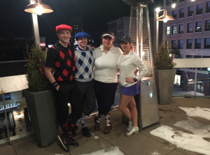 St. Thomas juniors Cole Olmschenk, Sam Taufen, Sarah Moon, and Taylor Ness sporting their award-winning uniforms. The team participated in the golf tournament last weekend in the Minneapolis skyways. (Photo courtesy of Sarah Moon)
