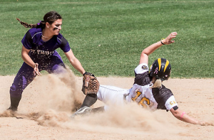 Second baseman Heather Kascht tags a Gustavus runner out at second base last weekend. Despite losing the MIAC championship, the St. Thomas softball team received an at-large bid to the NCAA Division-III tournament. (Jake Remes/TommieMedia)