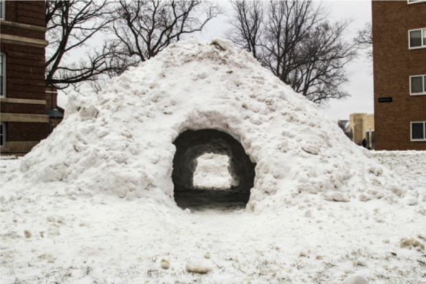 Not to be confused with an igloo, this quinzhee stands in front of the St. John Vianney Seminary on campus. The group of seminary students that fashioned it said they hope it becomes a tradition for future classes. (Carlee Hackl/TommieMedia)