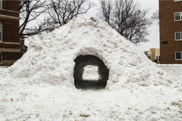 Not to be confused with an igloo, this quinzhee stands in front of the St. John Vianney Seminary on campus. The group of seminary students that fashioned it said they hope it becomes a tradition for future classes. (Carlee Hackl/TommieMedia)  