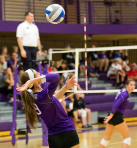 Middle blocker Kelly Foley serves the ball during the third set of the St. Thomas volleyball team's match against St. Catherine Sept. 25. In another conference matchup,The Tommies defeated the St. Benedict Blazers 3-0 Wednesday in St. Joseph, Minn. (Andrew Stafford/TommieMedia) 