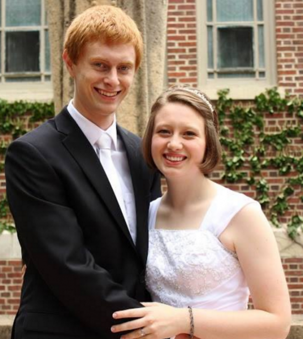 St. Thomas seniors Peter and Ryian Hilpisch pose for a photo after their wedding. The couple got married last August. (Caroline C. Rode Photography) 