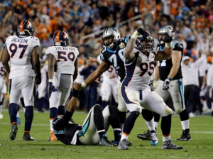 Denver Broncos’ Derek Wolfe (95) celebrates after sacking Carolina Panthers’ Cam Newton (1) during the second half of the NFL Super Bowl 50 football game Sunday, Feb. 7. (AP Photo/Julie Jacobson)