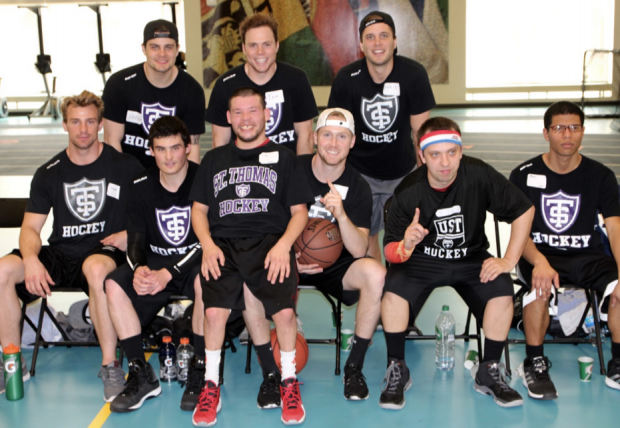 The St. Thomas Men’s Hockey team represents the Tommies at the MIAC Unified basketball tournament. The Special Olympics players and MIAC athletes came together as one team. (TommieMedia/Marissa Groechel)