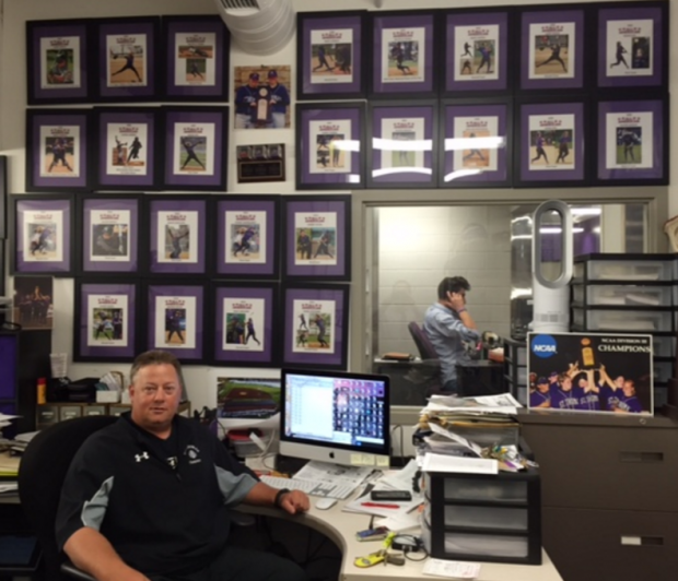 St. Thomas softball coach John Tschida has a wall in his office at the McCarthy Gym filled with photos of the All-Americans that he has coached during his tenure. Tschida recently coached his 1,000th career NCAA game. (TommieMedia/Taylor Smith) 