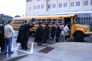 Commencement shuttle <p>Graduates and their families load onto shuttle buses to get to the Metrodome.</p>