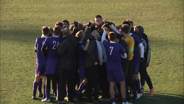 The St. Thomas men's soccer team celebrates its NCAA tournament success. (Courtesy University of Chicago) 