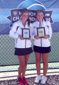 St. Thomas women’s tennis players Kara Lefsrud and Bridget Noack receive a plaque for their All-American status in 2013. Lefsrud and Noack will play a monumental role this season on and off the court. (Photo courtesy of Kara Lefsrud) 