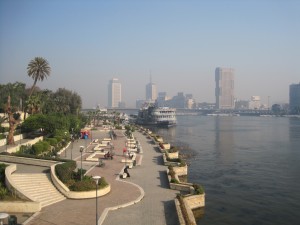 <p>The skyline of Cairo, where civil unrest has thrown the country into upheaval over the past week, is seen from Zamalk Island near the mouth of the Nile River. (Submitted photo/Tony Lewno) </p>