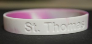 bracelet1 <p>Business law students sell bracelets for a profit so they can learn the principles of marketing. (Ashley Stewart/TommieMedia)</p>