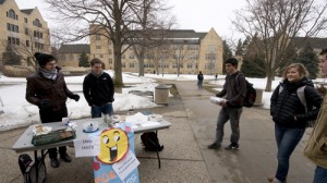 browniesforhaiti Juniors Hans Pflaumer and John Kharouf of Rock Climbing Club sell brownies to raise money for Haiti relief. (John Kruger/TommieMedia)