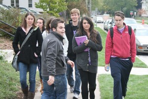 <p>Tour guide Corey Dahl leads a group of prospective students around campus Oct. 14, 2009. (TommieMedia file photo)</p>