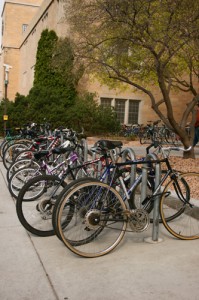 cycle St. Thomas bike culture is represented by full bike racks outside campus buildings. (Gina Dolski/TommieMedia)