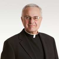 dease3 The Rev. Dennis Dease announced his retirement Thursday, May 10. (Courtesy of St. Thomas)