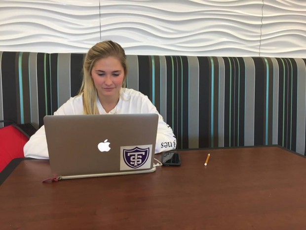 Sophomore Lauren Knisley uses her laptop for studying in the Anderson Student Center. St. Thomas recently joined eduroam, allowing students, faculty and staff to easily access Wi-Fi while on other campuses. (Mary Brickner/TommieMedia) 
