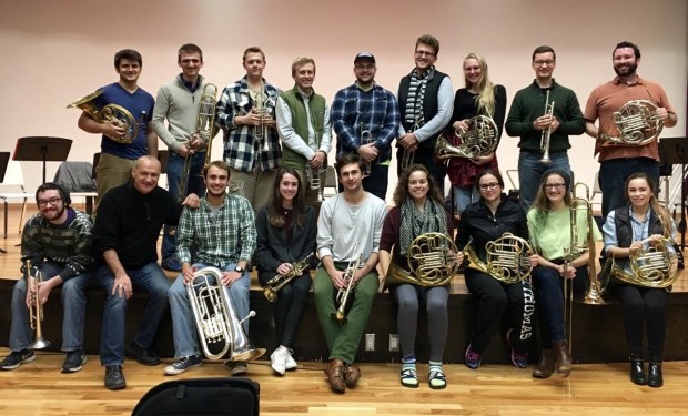 The St. Thomas brass choir poses for a photo. (Peter Monahan/TommieMedia)