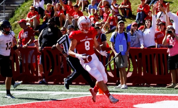 Matt Miller scores on a 78-yard touchdown pass from Jackson Erdmann with 3:12 to play in the first quarter to give St. John's a 21-0 lead over St. Olaf.  (Rachel Ketz/http://www.gojohnnies.com).