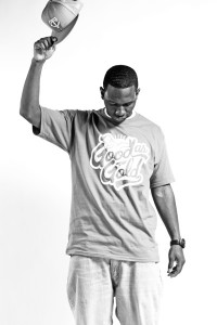 mally Tommie graduate of 2008, Malik Watkins works his day job to help fund his career as hip-hop artist Mally. (Photo courtesy Julian Murray Photography)