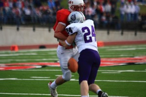 monmouthhalf1 <p>Cornerback Kirk Baglien forces a fumble that St. Thomas would eventually score on. (John Kruger/TommieMedia)</p>