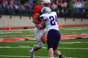 <p>Cornerback Kirk Baglien forces a fumble that St. Thomas would eventually score on.  (John Kruger/TommieMedia)</p>