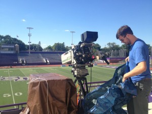 ESPN2 freelance videographer Brent Haglund sets up his camera in preparation for the network's high school football coverage at O'Shaughnessy Stadium Friday. Cretin-Derham Hall and Stillwater high schools will take the turf for one of ESPN2's 13 nationally broadcasted high school football games this fall at 7 p.m. (Briggs LeSavage/TommieMedia) 