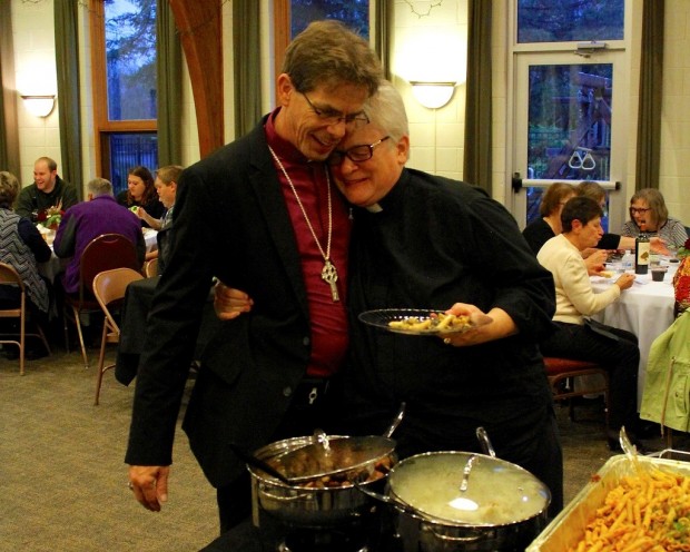 At the reception for his bishop ordination ceremony on Saturday, Rev. Martin Shanahan receives a hug from fellow pastor Rev. Colleen Woodley. Shanahan attended the Saint Paul Seminary at the University of St. Thomas before converting to Old Catholicism and starting his own church, Spirit of Hope, in Sunfish Lake, Minnesota. (Photo courtesy of Martin Shanahan)