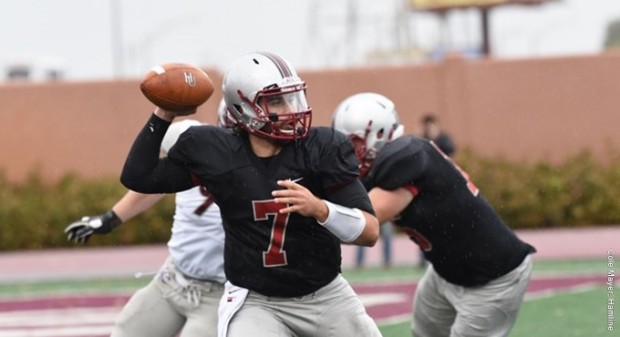 Hamline quarterback Justice Spriggs looks for a receiver Saturday in the Pipers' home victory over Augsburg. Spriggs passed for 317 yards and 5 touchdowns.
