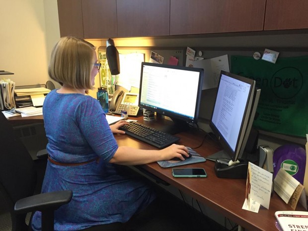 Sexual Misconduct Prevention Coordinator Emily Erickson works in her office. Erickson is spearheading an initiative to encourage sexual assault victims to come forward. (Mary Brickner/TommieMedia).