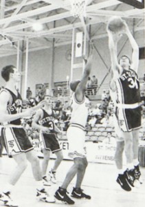 tauerlayup John Tauer, now an assistant men's basketball coach and psychology professor, attempts a layup during a 1993-94 Tommie basketball game.