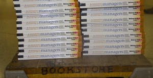 textbooks <p>New managerial accounting textbooks sit on a cart outside the bookstore located in the O'Shaughnessy Educational Center. According to the textbooks.com study, 91 percent of students said they saved money when purchasing used textbooks. (Hannah Anderson/TommieMedia)</p>