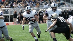 Junior running back Colin Tobin made the start for the Tommies rushing 85 yards on 14 carries with both a rushing and passing touchdown. (John Kruger/TommieMedia)